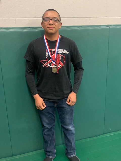 Gil Takes Gold at JV Districts